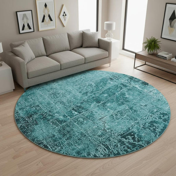 HomeRoots 8' Teal And Ivory Abstract Round Washable Rug with UV Protection, Ideal for Busy Homes & Patios 649057