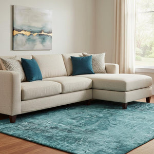 HomeRoots 9' X 12' Teal & Ivory Abstract Washable Area Rug - Durable, UV-Protected, Pet-Friendly Design! 649059