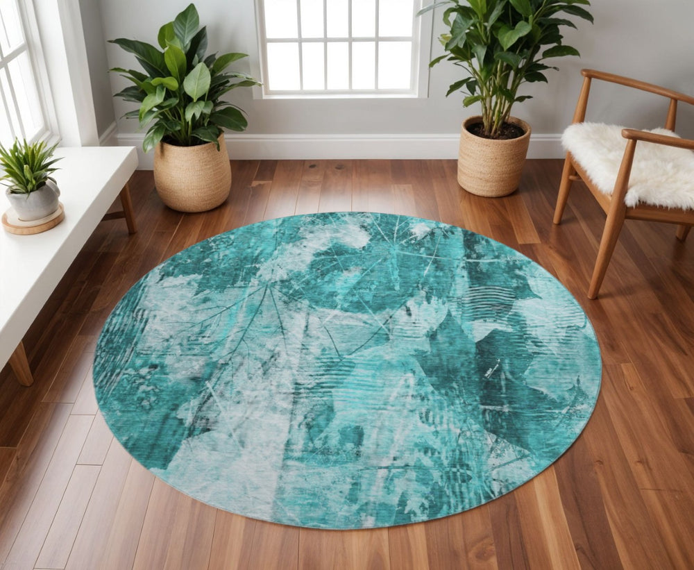 HomeRoots 8' Teal and Ivory Floral Round Rug – Durable, Washable, UV-Protected for Indoor and Outdoor Use 649093