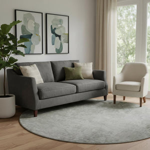 HomeRoots 8' Gray and Ivory Abstract Round Rug - Washable, UV Protected, Soft Polyester for Busy Homes 649399