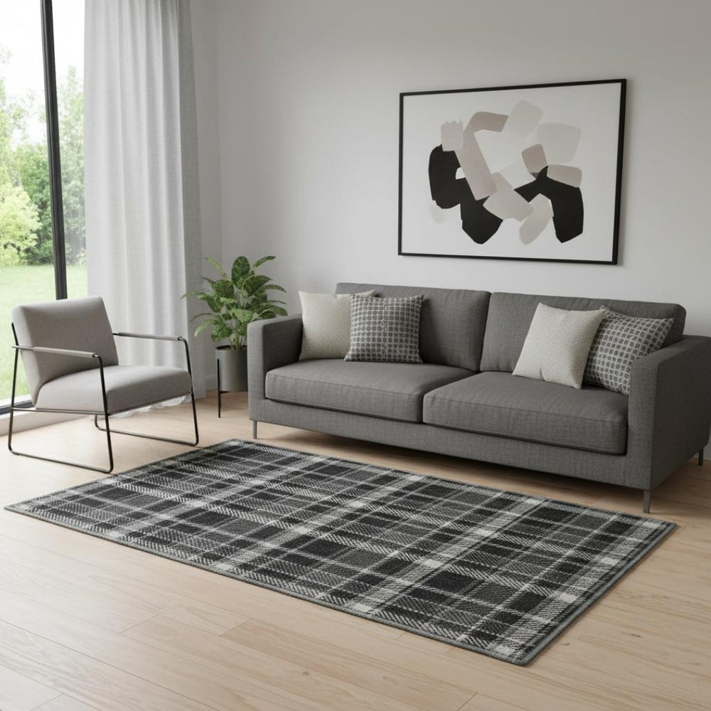 HomeRoots 5' X 8' Black And Ivory Plaid Area Rug - Washable, Stain-Resistant, UV-Protected for Family Spaces 649422