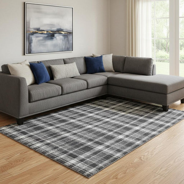HomeRoots 9' X 12' Classic Black and Ivory Plaid Area Rug – Washable, UV Resistant, Perfect for High-Traffic Spaces 649425
