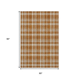 HomeRoots 5' X 8' Rust And Ivory Plaid Washable Area Rug – Stylish UV-Protected, Durable & Easy-Clean Design 649452