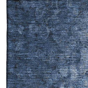 HomeRoots 5' X 8' Blue and Ivory Abstract Area Rug - Stylish, Washable, UV-Protected for High-Traffic Areas 649530