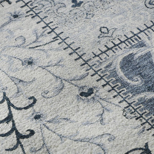 HomeRoots 8' Denim Blue & Ivory Patchwork Round Rug - Washable, UV Protected, Stain Resistant for High-Traffic Areas 649561