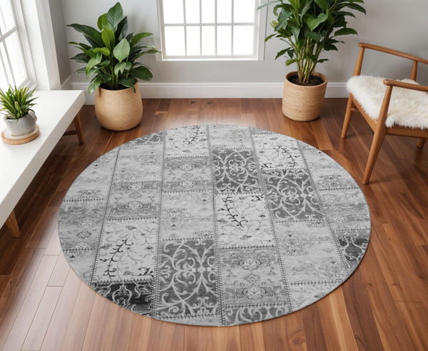 HomeRoots 8' Gray and Ivory Patchwork Round Rug - Washable, UV Protected, Soft & Stylish for High-Traffic Areas 649567