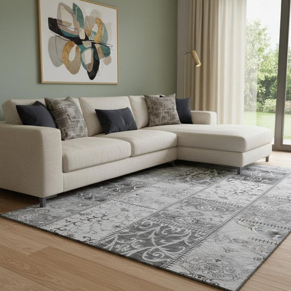 HomeRoots 8' X 10' Gray and Ivory Patchwork Area Rug - Washable, UV Protected, Soft, and Stain Resistant for Homes 649568