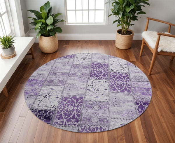 HomeRoots 8' Vibrant Purple and Ivory Patchwork Washable Round Rug with UV Protection for Busy Homes 649579