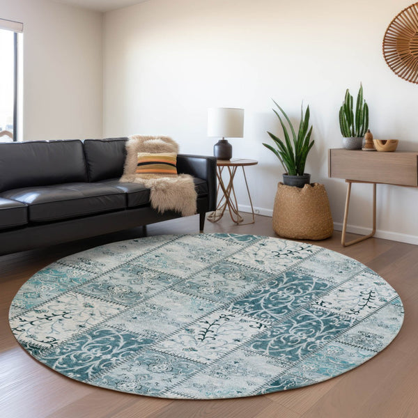 HomeRoots 8' Teal and Ivory Patchwork Round Rug - Washable, UV-Protected, Durable for Indoors & Patios 649591