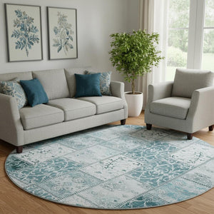 HomeRoots 8' Teal and Ivory Patchwork Round Rug - Washable, UV-Protected, Durable for Indoors & Patios 649591