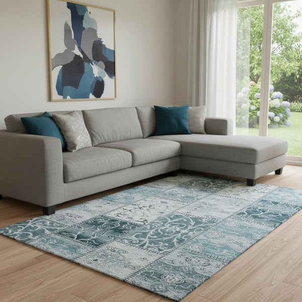 HomeRoots 8' X 10' Teal and Ivory Patchwork Area Rug - Washable, UV-Protected, Stain-Resistant for Everyday Use 649592