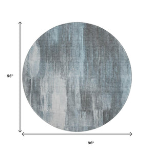 HomeRoots 8' Teal and Ivory Abstract Round Rug - Washable, Stain-Resistant, UV-Protected for Modern Homes 649615