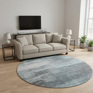 HomeRoots 8' Teal and Ivory Abstract Round Rug - Washable, Stain-Resistant, UV-Protected for Modern Homes 649615