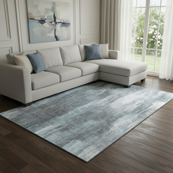 HomeRoots 8' X 10' Teal And Ivory Abstract Area Rug - Stylish, Washable, UV-Protected, Ideal for Family Spaces 649616