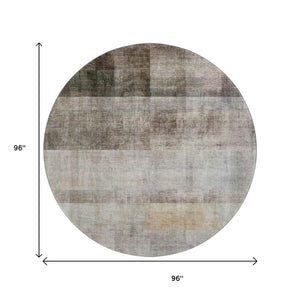 HomeRoots 8' Brown and Ivory Abstract Round Rug - Washable, UV-Protected for Indoor & Outdoor Spaces! 649621