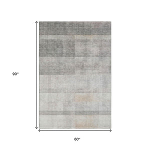 HomeRoots 5' X 8' Modern Taupe and Ivory Abstract Washable Area Rug with UV Protection for Stylish Durability 649650