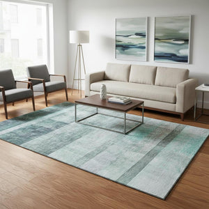 HomeRoots 5' X 8' Teal And Ivory Abstract Area Rug - Washable, UV Protected, Durable for High Traffic Spaces 649656