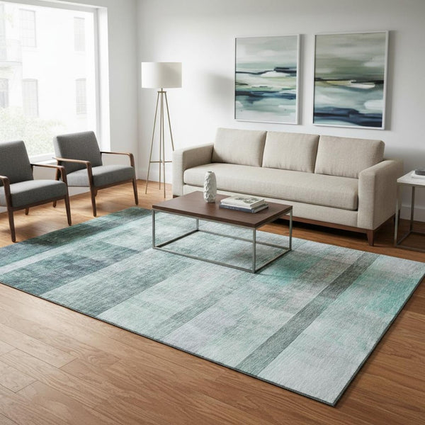 HomeRoots 5' X 8' Teal And Ivory Abstract Area Rug - Washable, UV Protected, Durable for High Traffic Spaces 649656
