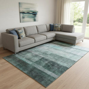 HomeRoots 9' X 12' Teal And Ivory Abstract Area Rug - Washable, UV-Protected, Durable, Perfect for High-Traffic Spaces 649659