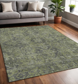 HomeRoots 5' X 8' Green and Gray Oriental Area Rug: Washable, UV Protected, Ideal for High-Traffic Spaces 649740