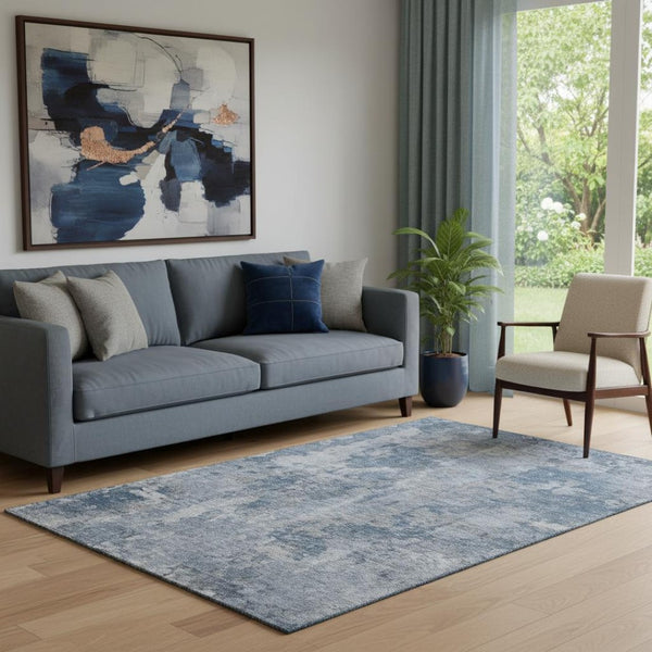 HomeRoots 5' X 8' Stylish Blue and Ivory Abstract Area Rug - Washable, UV Protected, Perfect for High-Traffic Spaces 649812