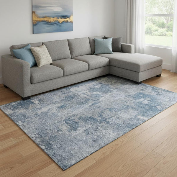HomeRoots 10' Blue and Ivory Abstract Area Rug - Washable, UV Protected, Perfect for High-Traffic Spaces! 649816