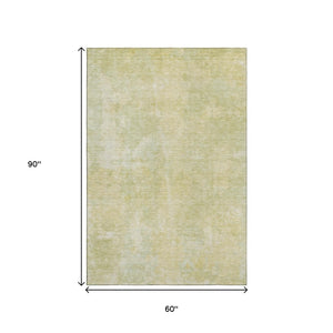HomeRoots 5' X 8' Gold And Ivory Abstract Area Rug - Washable, UV Protected, Stain Resistant for Modern Spaces 649824