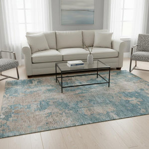 HomeRoots 5' X 8' Teal And Ivory Abstract Area Rug - Stylish, Washable, UV-Protected for High Traffic Spaces 649848