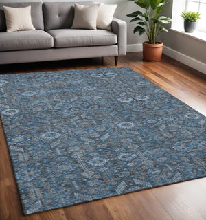 HomeRoots 5' X 8' Blue and Ivory Tribal Area Rug - Stain-Resistant, UV Protected for High-Traffic Spaces 649854