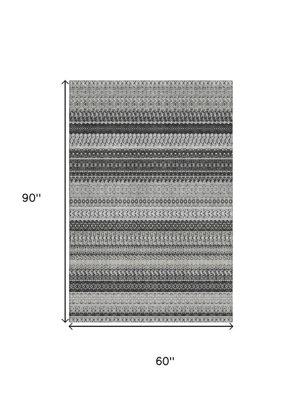 HomeRoots 5' X 8' Striped Washable Area Rug - Durable Black & Ivory Design with UV Protection for High Traffic Areas 649932