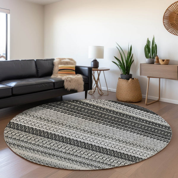 HomeRoots 8' Black And Ivory Striped Round Rug - Stylish, Washable, UV-Protected for High-Traffic Areas 649933