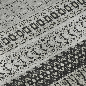 HomeRoots 8' Black And Ivory Striped Round Rug - Stylish, Washable, UV-Protected for High-Traffic Areas 649933