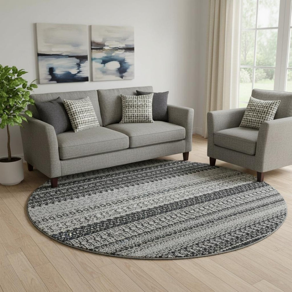 HomeRoots 8' Black And Ivory Striped Round Rug - Stylish, Washable, UV-Protected for High-Traffic Areas 649933