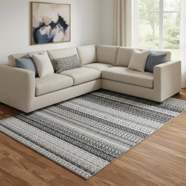 HomeRoots 8' X 10' Stylish Black and Ivory Striped Area Rug – Washable, UV Protected, Perfect for Homes! 649934