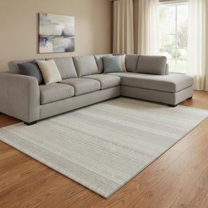 HomeRoots 10' X 14' Ivory And Beige Striped Area Rug – Washable, UV Protected, Ideal for High-Traffic Spaces 649942