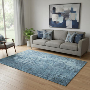 HomeRoots 5' X 8' Blue And Ivory Ikat Area Rug - Stylish, Washable, UV-Protected for High-Traffic Spaces 649980