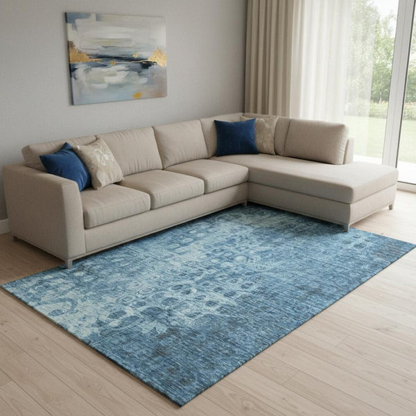 HomeRoots 9' X 12' Blue and Ivory Ikat Area Rug – Washable, UV Protected, Ideal for High-Traffic Spaces! 649983
