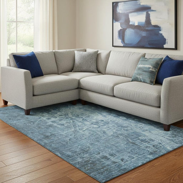 HomeRoots 10' Blue and Ivory Ikat Area Rug - Washable, Stain Resistant, UV Protected for High-Traffic Areas 649984