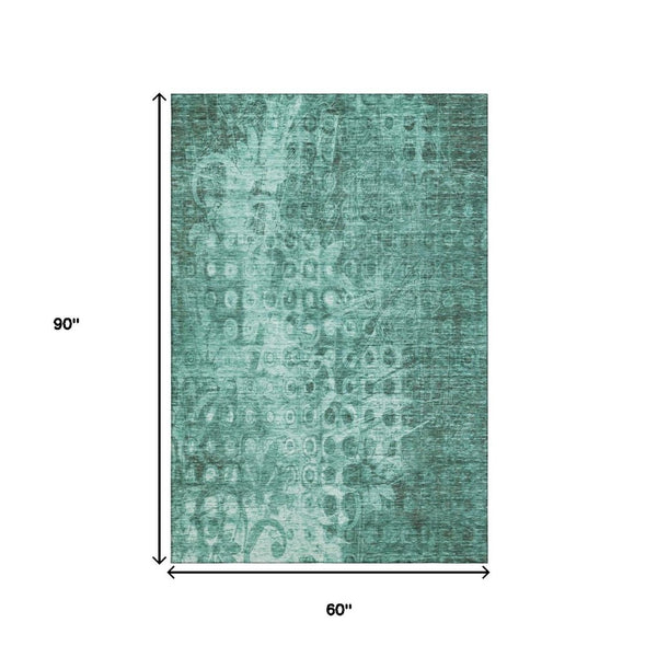 HomeRoots 5' X 8' Vibrant Teal And Ivory Ikat Area Rug - Washable, UV Protected, Stain Resistant & Durable Design 650010