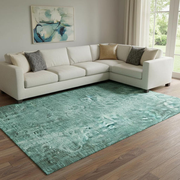 HomeRoots 8' X 10' Teal and Ivory Ikat Area Rug - Washable, UV Protected, Perfect for High-Traffic Spaces 650012
