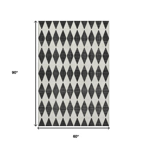 HomeRoots 5' X 8' Stylish Black and Ivory Diamond Area Rug – Washable, Durable, UV-Protected & Pet Friendly! 650022
