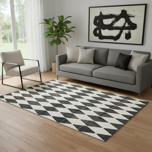 HomeRoots 5' X 8' Stylish Black and Ivory Diamond Area Rug – Washable, Durable, UV-Protected & Pet Friendly! 650022