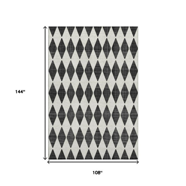 HomeRoots 9' X 12' Black And Ivory Diamond Area Rug - Washable, UV Protected, Perfect for High-Traffic Spaces! 650025