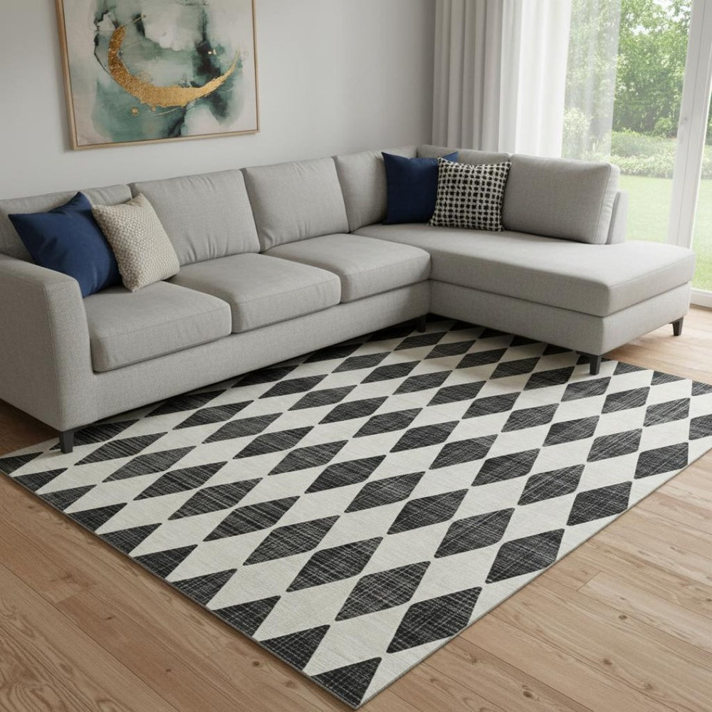 HomeRoots 9' X 12' Black And Ivory Diamond Area Rug - Washable, UV Protected, Perfect for High-Traffic Spaces! 650025