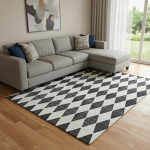 HomeRoots 10' X 14' Black And Ivory Diamond Area Rug – Durable, Washable, UV-Protected for Stylish Living Spaces 650026