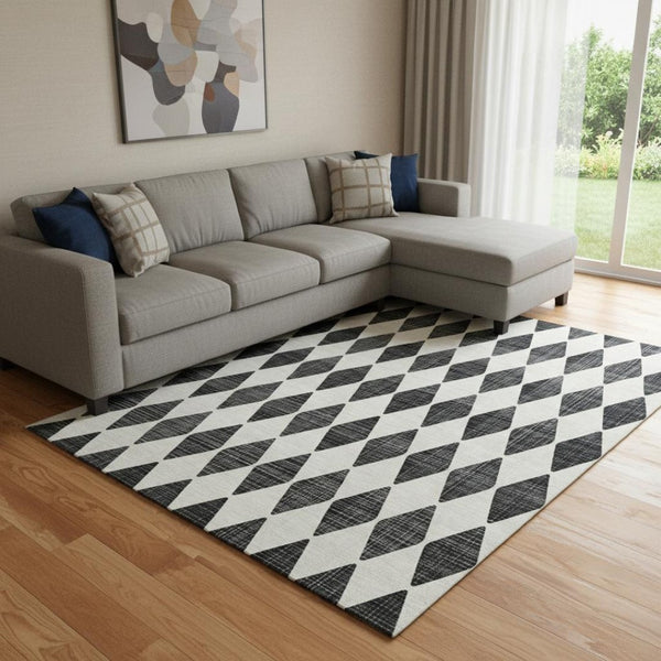 HomeRoots 10' X 14' Black And Ivory Diamond Area Rug – Durable, Washable, UV-Protected for Stylish Living Spaces 650026