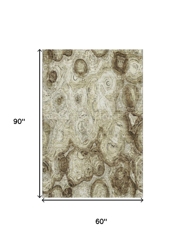 HomeRoots 5' X 8' Beige and Brown Abstract Washable Area Rug with UV Protection for Kids and Pets' Safety 650142