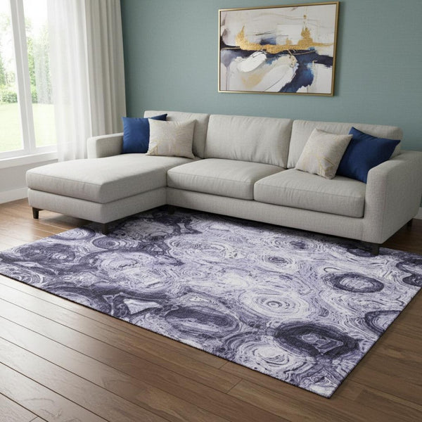 HomeRoots 8' X 10' Abstract Purple & Ivory Washable Area Rug - Soft, Durable, UV Protected for Modern Spaces 650174