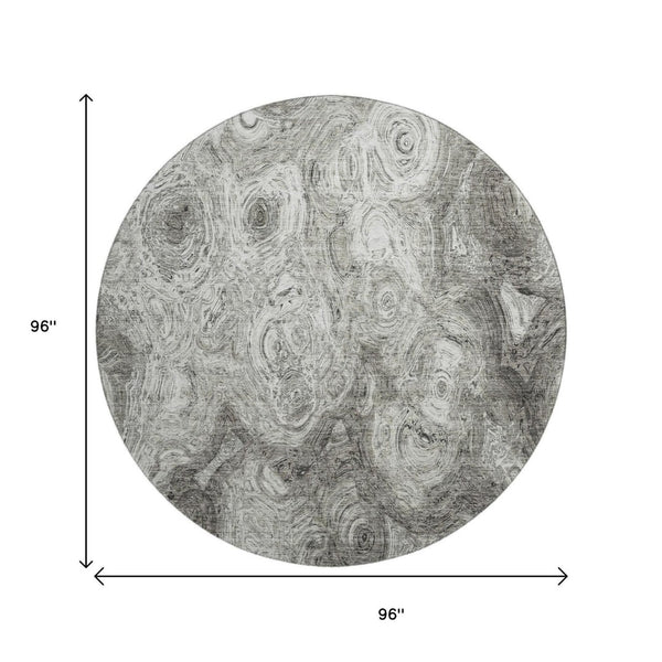 HomeRoots 8' Washable Silver and Gray Abstract Round Rug - UV Resistant, Stain-Proof, Ideal for Homes with Kids & Pets 650179