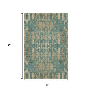 HomeRoots 5' X 8' Teal and Beige Moroccan Area Rug - Washable, UV Protected, Perfect for Homes with Kids & Pets! 650226